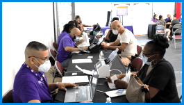 Detroit water utility staff sign up consumers for bill payment assistance program