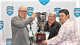 Taste Test trophy presented to City of Miramichi, New Brunswick, with, from left, Darren Row, Jay Shanahan and Dave Gaylinn, photo credit Black Ram Media.
