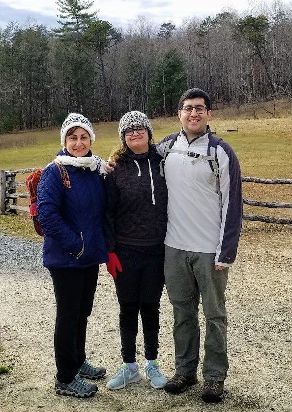 Amir Alansari with mother and sister