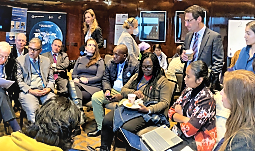 Loren Labovitch, standing second from right, during roundtable discussion