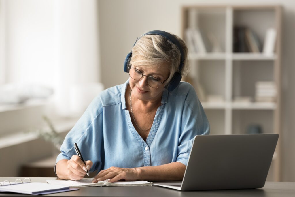 Focused,Older,Woman,Studying,Online,On,Retirement,,Gain,New,Knowledge,