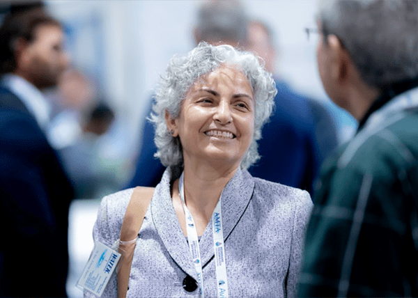 older-woman-smiling-in-conversation