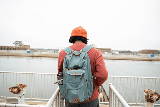 summit-group-member-looking-at-water